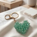 Charme de sac DORÉA turquoise fait main avec perles en faux crystal et mousqueton doré en acier inoxydable, accessoire élégant et léger pour sac et clés